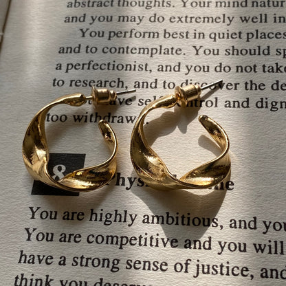 Twisty golden hoops