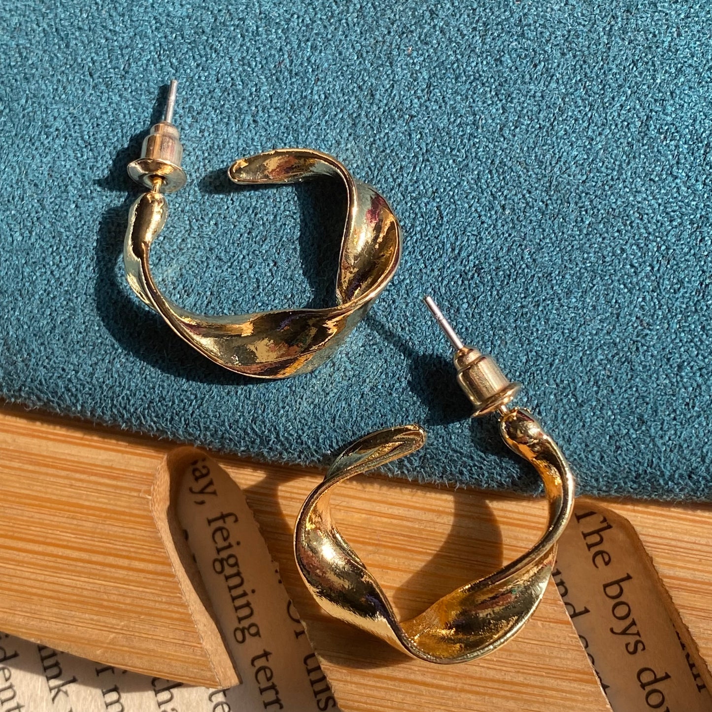 Twisty golden hoops