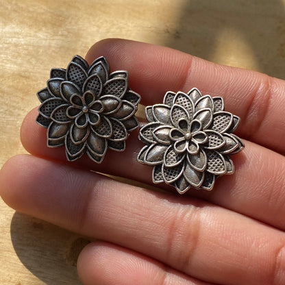 Silver flower studs