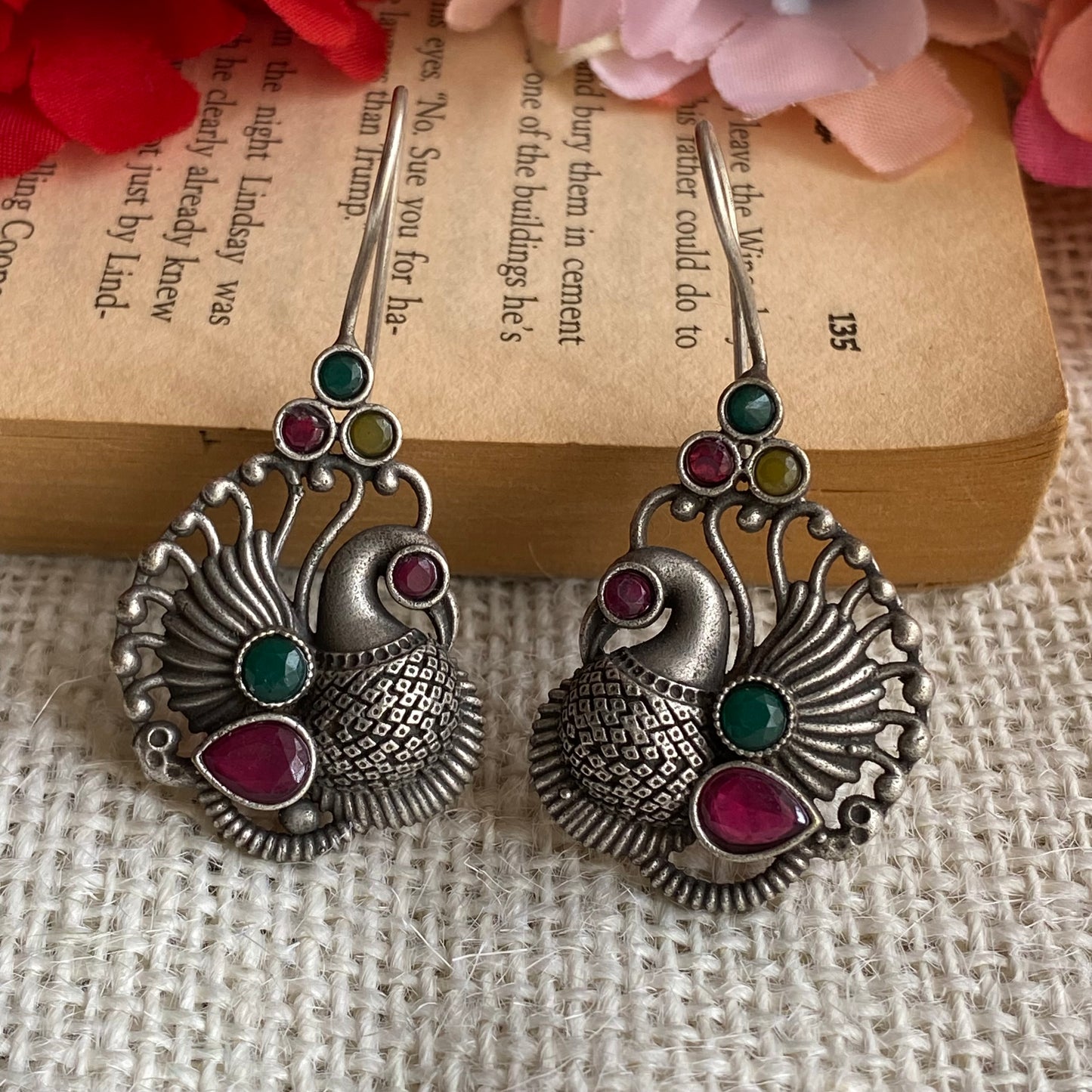 Multi peacock studs