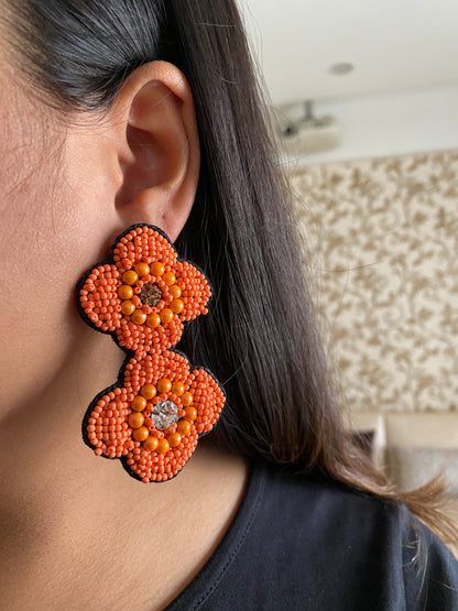 Double flower beaded earrings