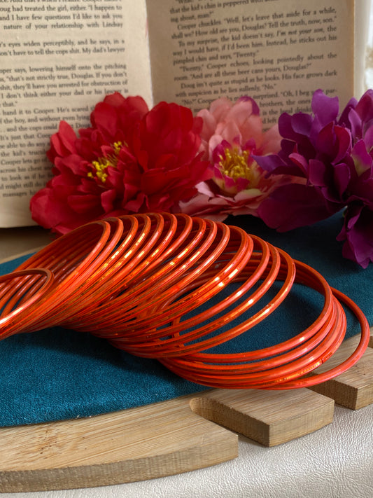 Orange metallic bangles