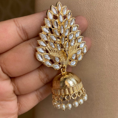 Gold peacock jhumkas